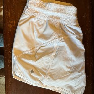 White lululemon 4” tracker shorts sz 10